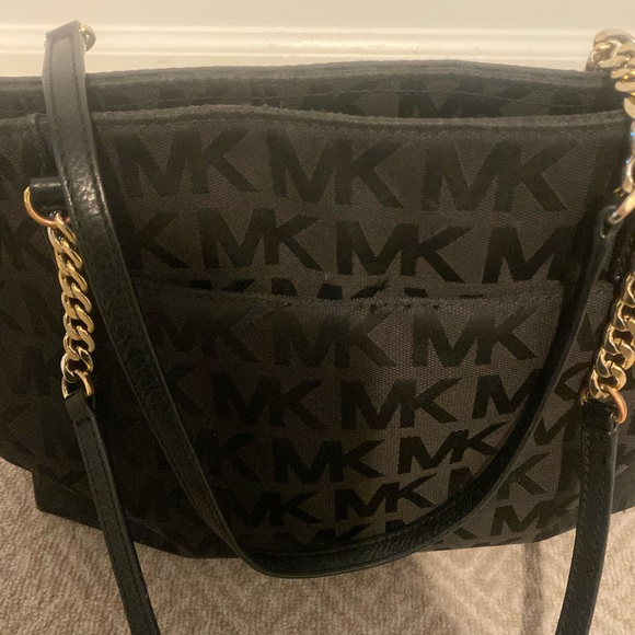 Black Michael Kors purse. Great size. Used with some normal wear and tear. - Picture 4 of 5